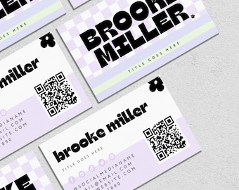 May include: Rectangular business cards featuring a light purple and white chequered pattern, black bold typography reading BROOKE MILLER, a QR code, social media icons, and placeholder text including email, website, and phone number.