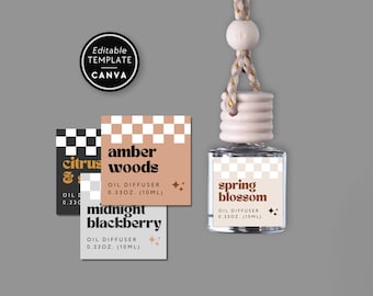 Puede incluir: Un frasco difusor de aceite de vidrio transparente con tapa de madera y cordón para colgar, con una etiqueta que dice Spring Blossom, Oil Diffuser, 0.33oz (10ml). Se muestran tres etiquetas cuadradas adicionales con Citrus & Sage, Amber Woods y Midnight Blackberry.