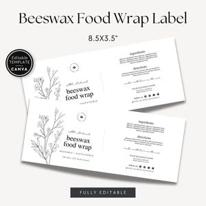 Könnte beinhalten: Eine weiße, rechteckige Etikettenvorlage für Bienenwachstücher mit schwarzer Strichzeichnung von Wildblumen auf der linken Seite. Der Text enthält 'beeswax food wrap', 'Ingredients', 'Directions' und Platzhalter für Geschäftsdaten. Es misst 21,6x8,9 cm.