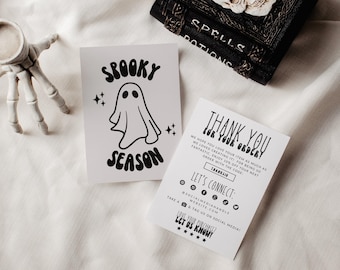 May include: Two white rectangular cards with black text and graphics. One card features a ghost illustration with the text SPOOKY SEASON. The second card reads THANK YOU FOR YOUR ORDER and includes social media icons and contact information.