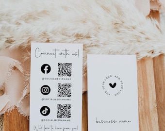 Könnte beinhalten: Zwei weiße rechteckige Visitenkarten mit schwarzem Text und Grafiken. Eine Karte zeigt den Text Connect with us!, Social-Media-Symbole, QR-Codes und We'd love to hear from you!. Die andere Karte zeigt ein Herz-Logo, einen Firmennamen, eine E-Mail-Adresse und eine Website.