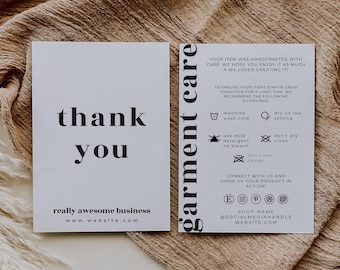 May include: Two white rectangular cards with black text. The left card reads thank you and really awesome business. The right card is titled garment care and lists washing instructions with icons, social media symbols, and website information.