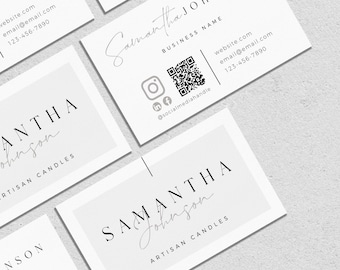 May include: A collection of white business cards featuring black text. The cards display the name Samantha Johnson, the text Artisan Candles, a QR code, social media icons for Instagram, LinkedIn, and Facebook, and contact details.