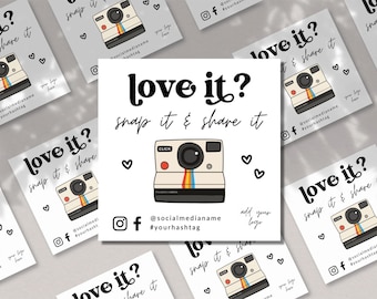 May include: A square social media card featuring the text love it? snap it & share it in black font. The design includes a graphic of a beige instant camera with a rainbow stripe, small heart icons, and placeholders for a logo and handle.