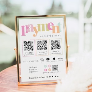 May include: A rectangular payment sign in a gold metal frame featuring the word payment in colorful letters. It includes three QR codes for Venmo, Cashapp, and Paypal, icons for cash, credit, Apple Pay, and Google Pay, plus social media handles.