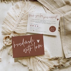 May include: A rectangular card with a dark terracotta background and the white text 'handmade with love' next to a small heart. A second white card features the text 'thank you for your support' and social media icons.