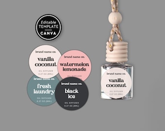 May include: A clear glass oil diffuser bottle with a wooden cap and hanging cord, accompanied by four circular labels featuring the text brand name co. and scents including vanilla coconut, watermelon lemonade, fresh laundry, and black ice.