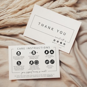 May include: Two white rectangular cards with black text and icons. The top card reads THANK YOU and includes social media icons. The bottom card provides care instructions for a candle warmer, including safety warnings and a discount code.