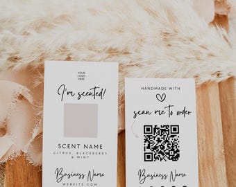 May include: Two white rectangular business cards with black text and graphics. The left card reads I'm scented, Scent Name, Citrus, Blackberry & Mint, and Business Name. The right card reads Handmade with love, scan me to order, a QR code, and Business Name with social media icons.