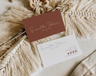 May include: Two rectangular business cards featuring the name Samantha Johnson in a script font. One card is dark terracotta with white text, and the other is white with dark text, including contact details and social media icons.