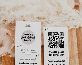 May include: Two white rectangular business cards with black text and star icons. The left card features the text drag & drop logo, you've got great taste!, SCENT NAME, CITRUS, BLACKBERRY & MINT, HANDMADE WITH, and Business Name. The right card shows a QR code, scan me to order, Business Name, social media icons, and placeholders for a handle and website.