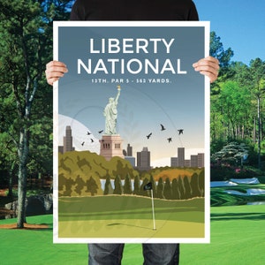 May include: A poster with a blue background and the text "LIBERTY NATIONAL 13TH. PAR 5 - 563 YARDS."  The poster features a cartoon illustration of the Statue of Liberty on a golf course with a green.