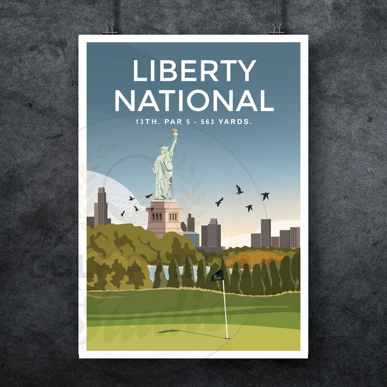 May include: A poster with a blue background and the text "Liberty National" in white. The text "13th. Par 5 - 563 Yards." is below the title. The poster features a green golf course with a flag in the foreground. A statue of the Statue of Liberty is in the background, with a cityscape behind it.