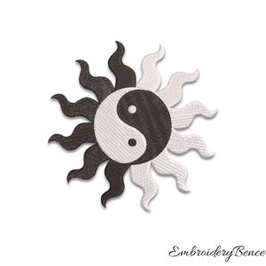 May include: Black and white yin yang symbol inside a sunburst design. The sunburst is made of black and white embroidery.