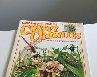 May include: A vintage children's book titled "Creepy Crawlies: Insects and Other Tiny Animals" by Usborne First Nature. The cover features a colorful illustration of various insects and other small creatures, including a dragonfly, a caterpillar, a ladybug, a grasshopper, and a snail.