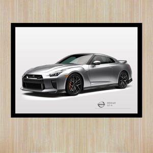 Op de afbeelding: Zilveren Nissan GT-R sportwagenprint in een zwarte lijst. De auto wordt van opzij getoond, met zwarte wielen en oranje remklauwen. Het Nissan-logo en de GT-R-tekst zijn zichtbaar.
