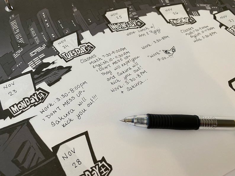 May include: A close-up of a calendar with handwritten notes for the month of November. The notes include class schedules, work hours, and reminders. The text includes "Don't mess up" and "Sakura will kick you out!"