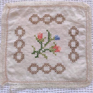 Vintage Hand Embroidered Ecru Linen Doily. Mid century, cross stitch floral & geometric embroidery. Green blue pink floral centre, lace edge