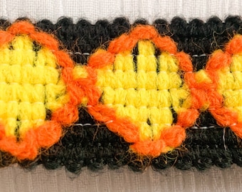 Vintage Furnishing Trim. Geometric Diamond Pattern. Bright Yellow Orange Diamonds on Black. 2cm wide Woven Wool Trim. Sold by the Metre.