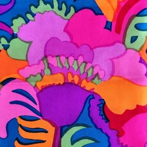 May include: A vibrant, abstract floral pattern in shades of blue, pink, orange, green, and purple. The design features large, stylized flower shapes with intricate details, creating a bold and colorful textile design.