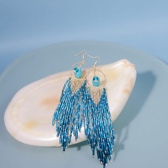 Handmade lake blue fringe earrings