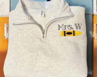 Personalized machine embroidered 1/4 zip sweatshirt with crayon design