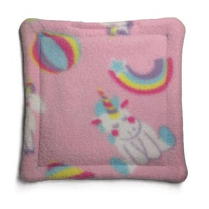 May include: Pink fleece square cushion with a unicorn, rainbow, and star pattern.