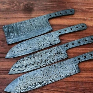 May include: Four handcrafted steel knives with patterned blades and riveted handles are displayed on a wooden surface. The blades have a unique, swirling design. The knives vary in size and shape, including a cleaver.