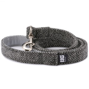 May include: A gray tweed dog leash with a silver clip and a black label that says "Dogs Heritage".