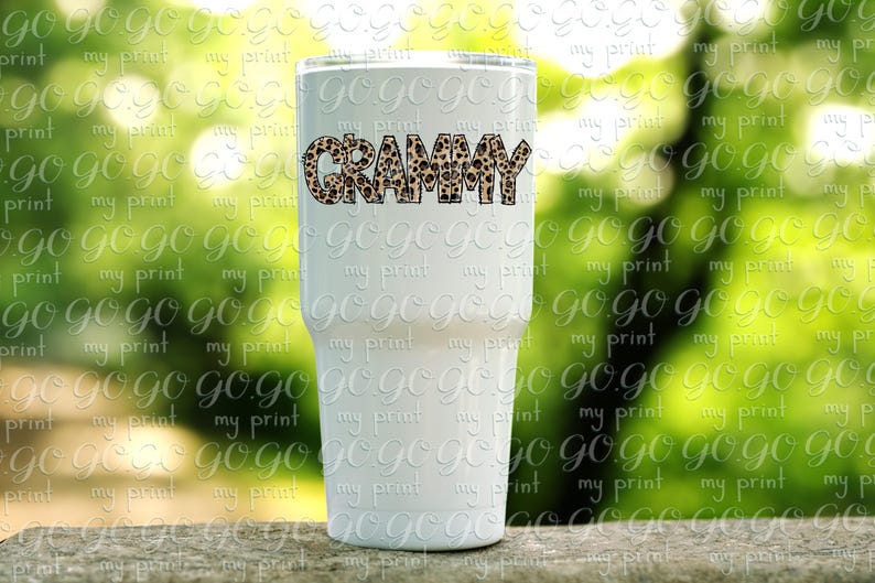 Grammy leopard print lettering displayed on a white tumbler as a sublimation project mockup.
