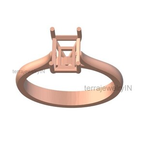 May include: A rose gold ring with a square-shaped setting for a gemstone. The setting is open on all sides, allowing for a large stone to be set.