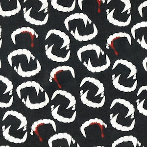 May include: Black fabric with a repeating pattern of white vampire teeth. Each tooth set has a red blood drip. The teeth are arranged in a random pattern across the fabric.