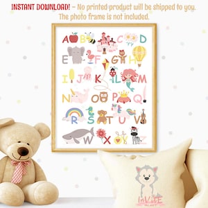 May include: A framed alphabet print featuring colorful illustrations of various objects and animals, each corresponding to a letter. The print includes a red apple, a bee, a castle, a daisy, an elephant, a flamingo, a kite, a gingerbread man, a hot air balloon, a mermaid, and a zebra.