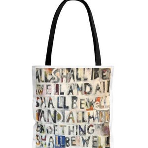 May include: White tote bag with black handles featuring a colorful abstract design with the text "All shall be well and all shall be well and all manner of thing shall be well".