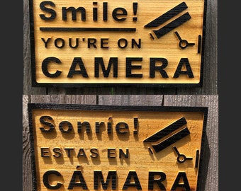 Security Sign: "Smile You're on Camera" "Sonríe Estas En Cámara" English or Spanish. Real Estate or Homebuyer Gifts. Weather-Resistant Cedar