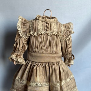 Composition doll body and outfit