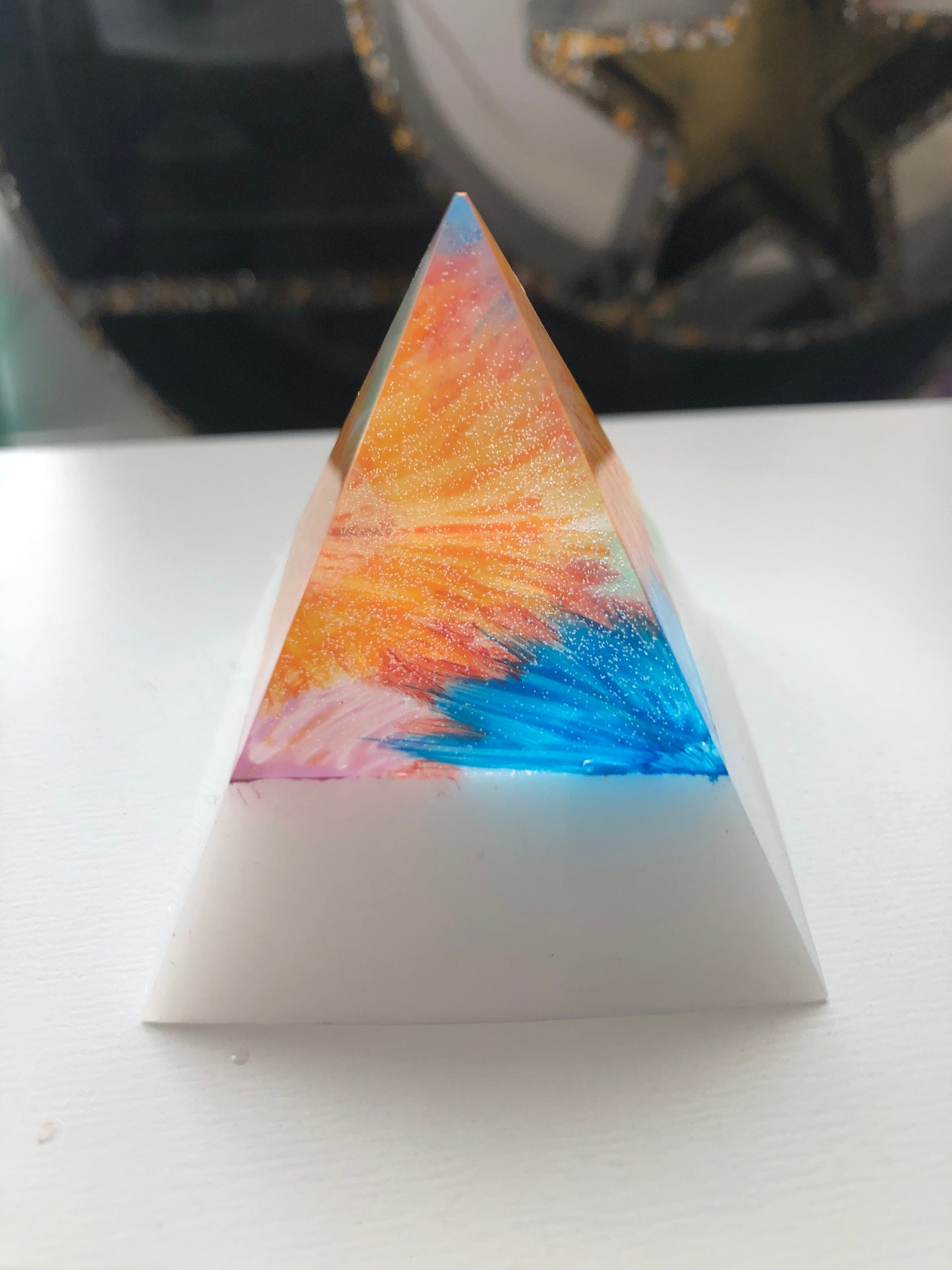 Resin pyramid with hand painted pattern inside. Etsy