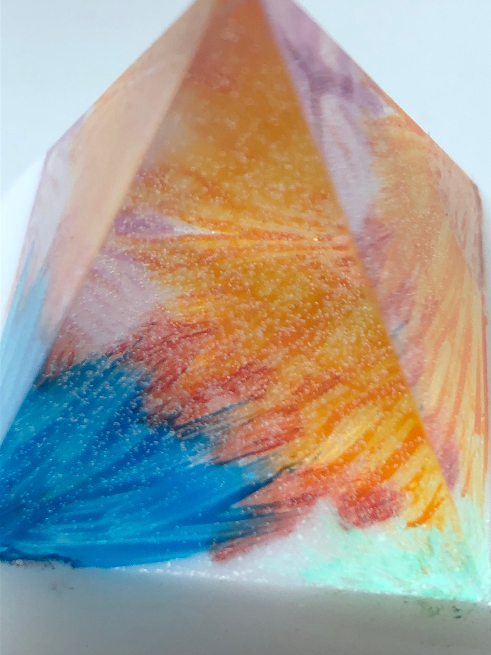 Resin pyramid with hand painted pattern inside. Etsy