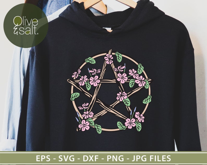 May include: A black hoodie with a pentagram design featuring a circle of twigs with pink and purple flowers. The design is centered on the hoodie.