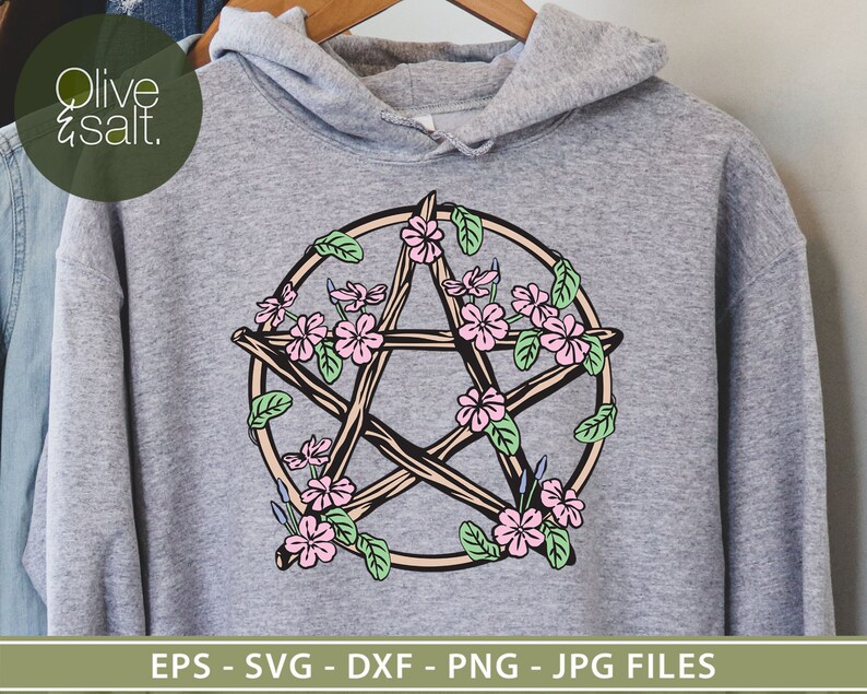 May include: A gray hoodie with a pentagram design featuring a five-pointed star surrounded by pink flowers and green leaves. The text "Olive & Salt." is visible in the top left corner of the image.