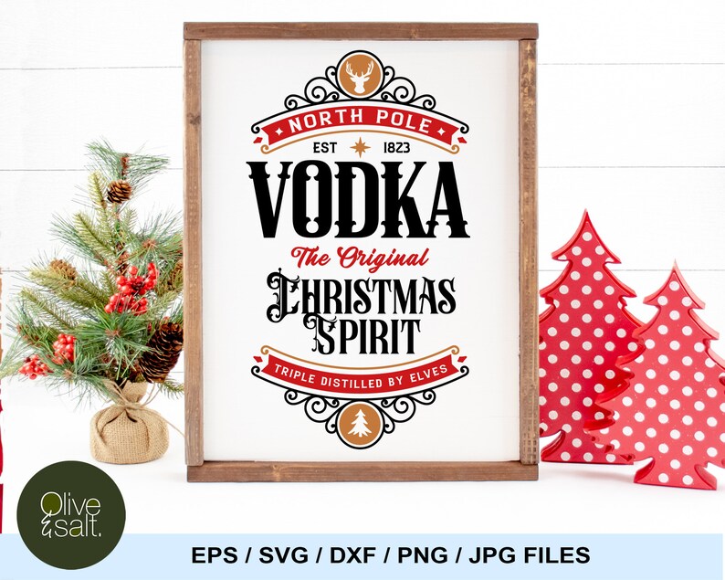 May include: A white sign with a brown wood frame, featuring a vintage-style design with the text "North Pole Vodka The Original Christmas Spirit Triple Distilled by Elves". The sign has a red and gold color scheme and a reindeer illustration.