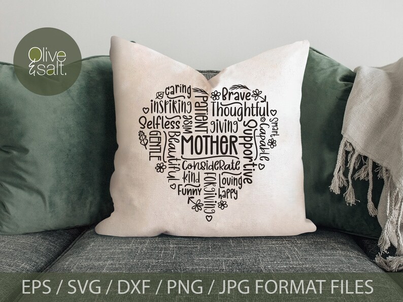 May include: A white pillow with a black heart-shaped design. The heart is filled with words describing a mother, such as "caring", "thoughtful", "supportive", and "loving".