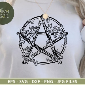 May include: A black and white illustration of a pentagram surrounded by stylized flowers and branches. The design is on a white sweatshirt.