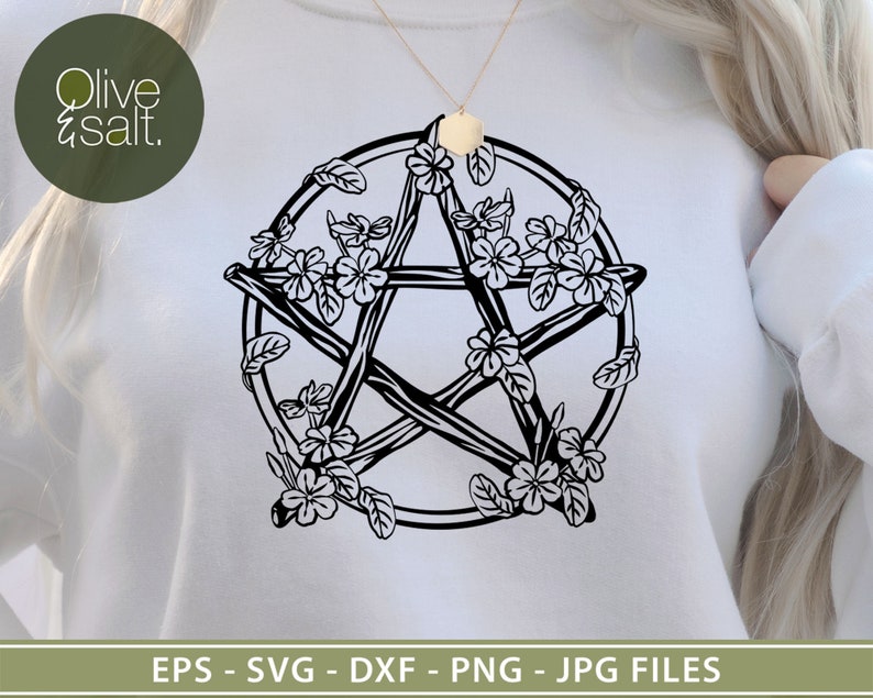 May include: A black and white illustration of a pentagram surrounded by stylized flowers and branches. The design is on a white sweatshirt.
