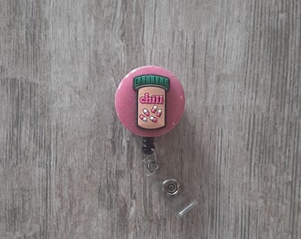 Soporte de insignia de píldora fría