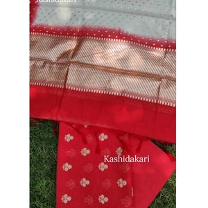 Banarasi Handloom Dress Material with Contrast color Handloom weaving & Tasseled Dupatta