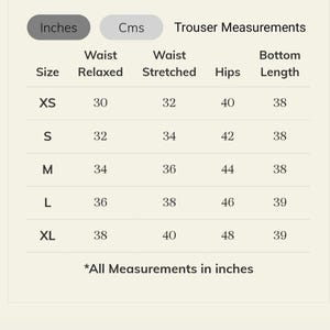 May include: A white chart displays trouser measurements in inches. Sizes XS to XL are listed with waist relaxed, waist stretched, hips, and bottom length measurements. The chart includes the text "All Measurements in inches."