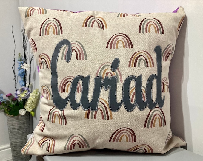 Clustog enfys’Cariad’ / Cariad (love) rainbow cushion