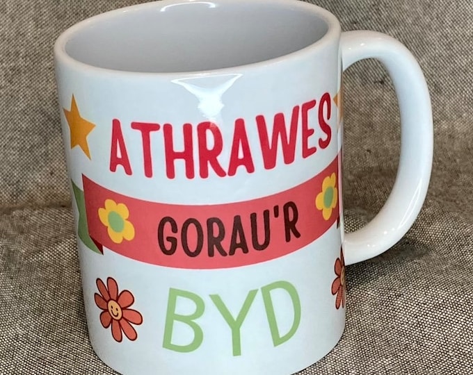 Myg ‘Athrawes orau'r Byd' neu 'Athrawes Gorau'r Byd' Mug