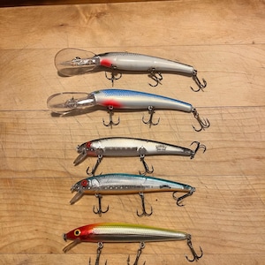 5 Vintage Fishing Lures ( Bomber , Mann’s , Rapala )